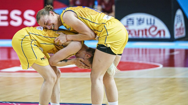 Bosnietes pēc uzvaras pār Beļģiju. Foto: FIBA