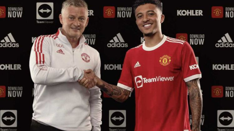 Ūle Gunnars Sulšērs un Džeidons Sančo. Foto: Manchester United