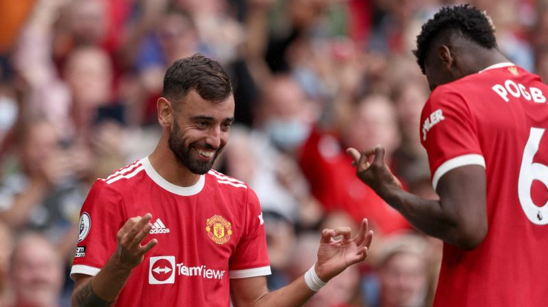 "Manchester United" varoņi - Brunu Fernandišs un Pols Pogbā. Foto: AFP/Scanpix