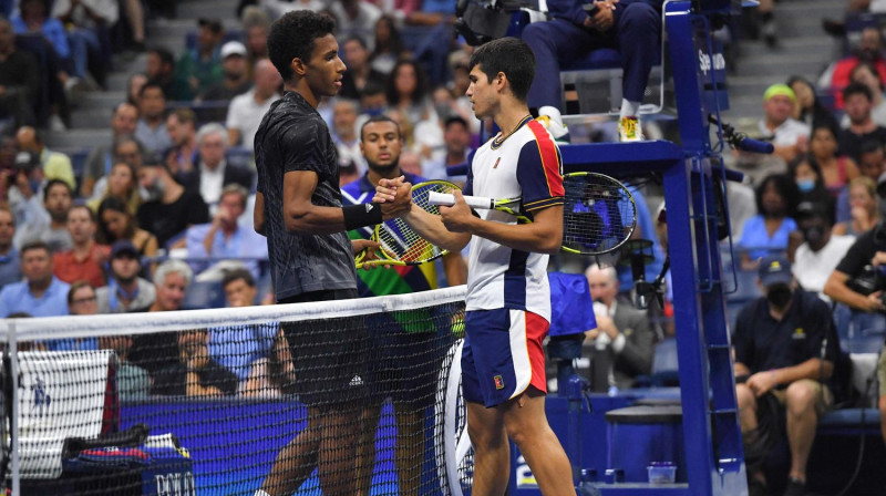 Fēlikss Ožē-Aliasims un Karloss Alkarass. Foto: AFP/Scanpix