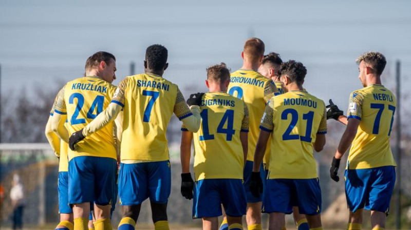 Andrejs Cigaņiks ar komandas biedriem. Foto: DAC 1904