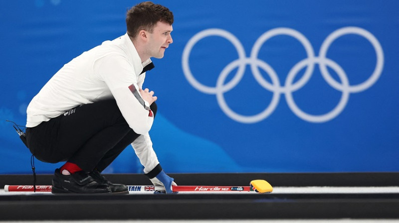 Brūss Mouats aizveda līdz ceturtajai vietai Lielbritānijas jaukto pāru komandu un nu cīnīsies par medaļām arī vīru turnīrā. Foto: Reuters/Scanpix