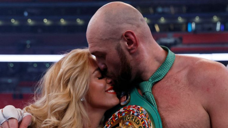 Taisons Fjūrijs ar sievu. Foto: Reuters/Scanpix