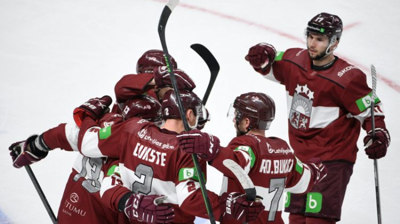 Hokeja izlase svin vārtu guvumu pret Kazahstānu. Foto: LHF