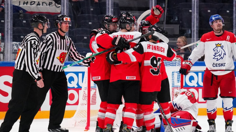 Austrijas hokejisti. Foto: IIHF