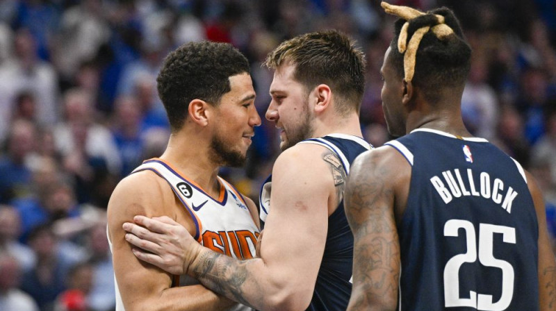 Devins Bukers un Luka Dončičs. Foto: USA TODAY Sports/Scanpix