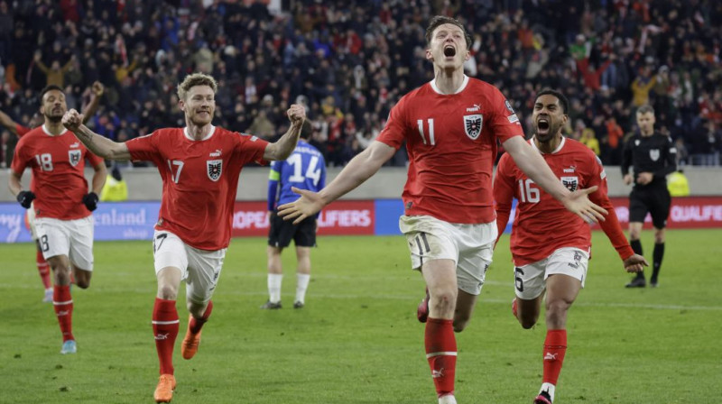 Austrijas futbolisti priecīgi par uzvaras vārtiem. Reuters. Scanpix