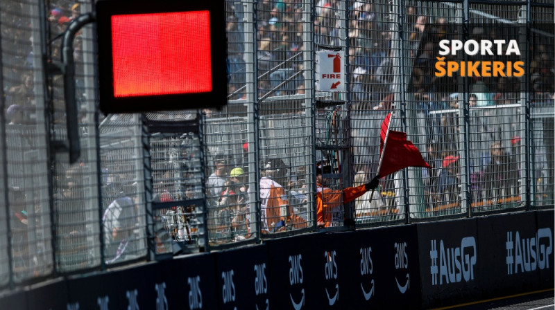 Tiesnesis ar sarkano karogu signalizē par Austrālijas GP pārtraukšanu. Foto: IMAGO/HochZwei/Scanpix