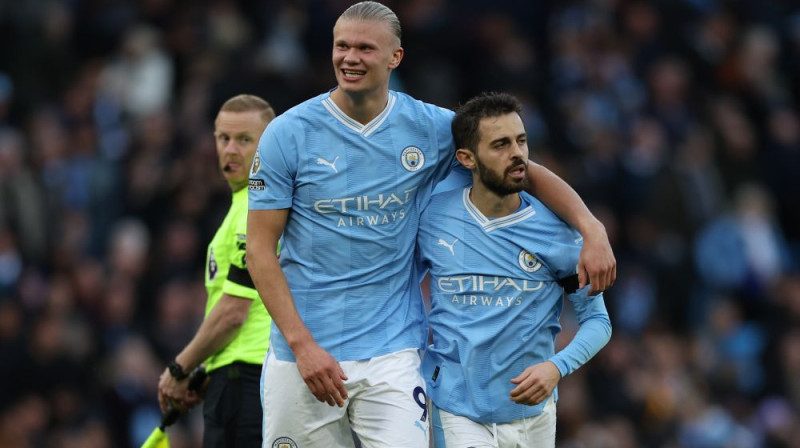 Ērlings Holanns un Bernardu Silva. Foto: EPA/Scanpix