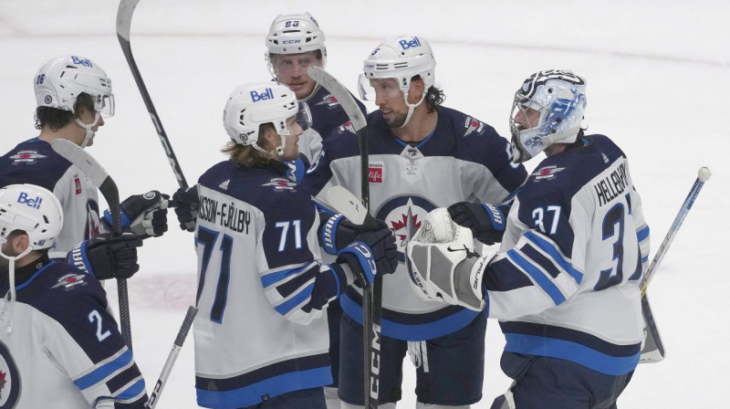 Vinipegas "Jets" hokejisti. Foto: Jeff Chiu/AP/Scanpix