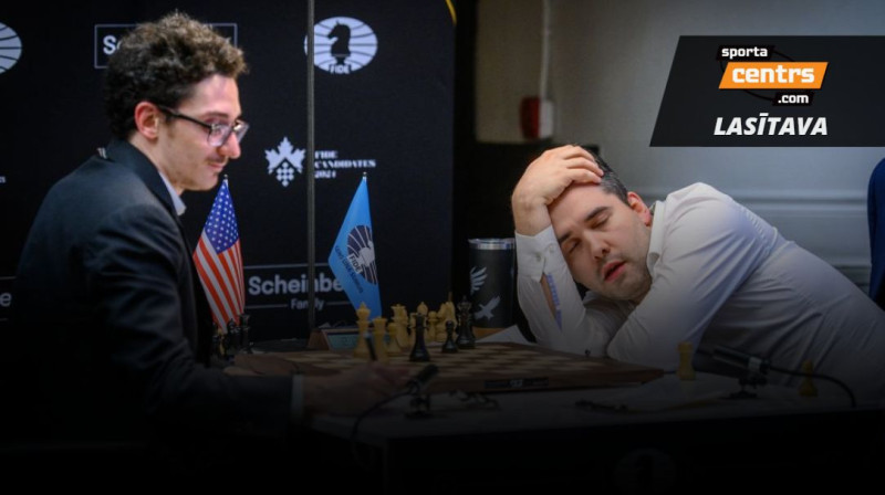 Fabiāno Karuana un Jans Ņepomnjaščijs spēles izskaņā. Foto: FIDE