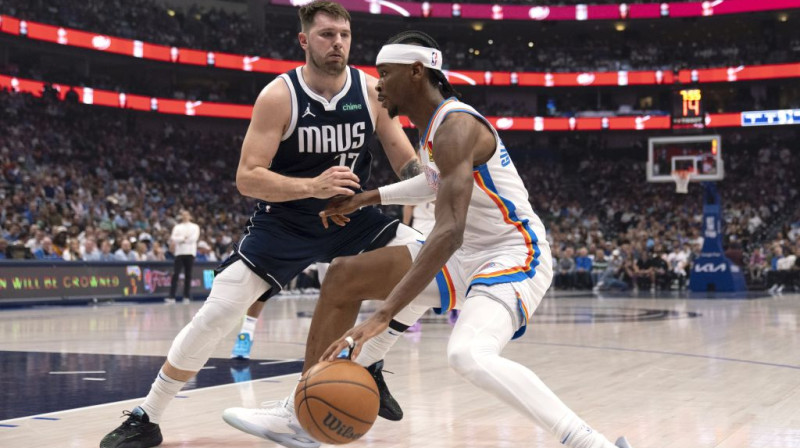 Luka Dončičs un Šejs Gildžess-Aleksandrs. Foto: AP/Scanpix