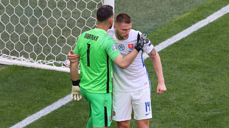 Martins Dūbravka un Milans Škrinjars. Foto: ZUMAPRESS/Scanpix