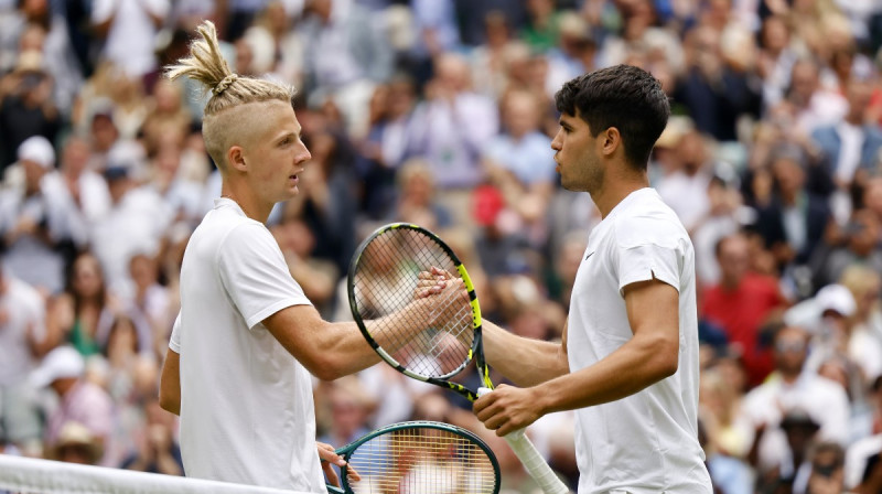 Marks Lajals un Karloss Alkarass. Foto: EPA/Scanpix