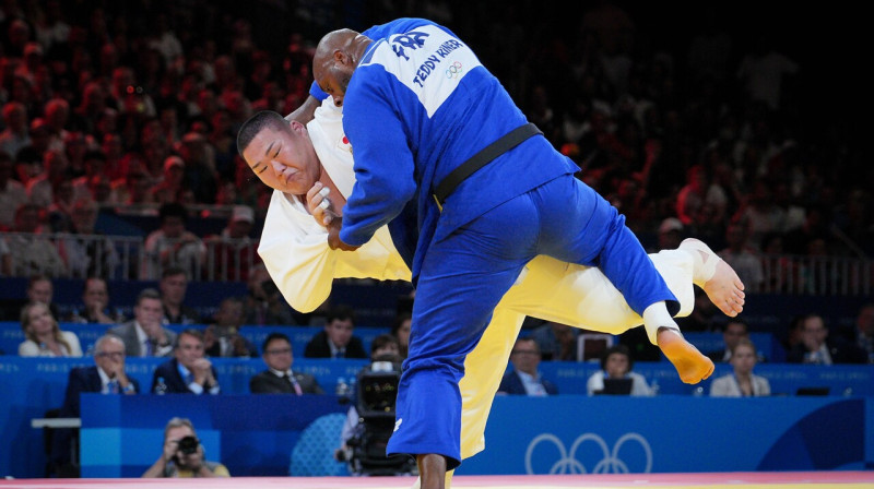 Džudo sacensības: japānis Tacuro Saito pret francūzi Tediju Rineru. Foto: Laurent Vu/SIPA/Scanpix