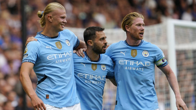 Ērlings Holanns, Bernardu Silva un Kevins de Breine. Foto. AP/Scanpix