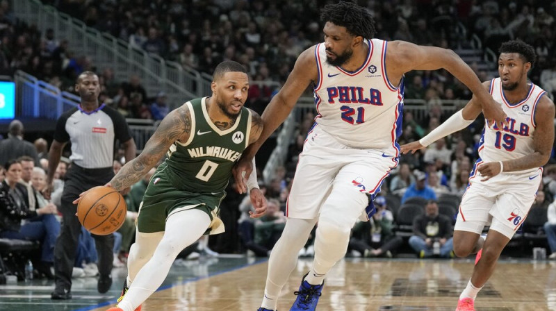 Deimiens Lilards pret Džoelu Embīdu. Foto: USA Today Sports/Scanpix