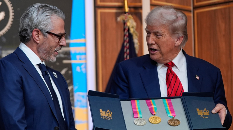 Donalds Tramps nopelna olimpiskās medaļas. Foto: AP/Scanpix
