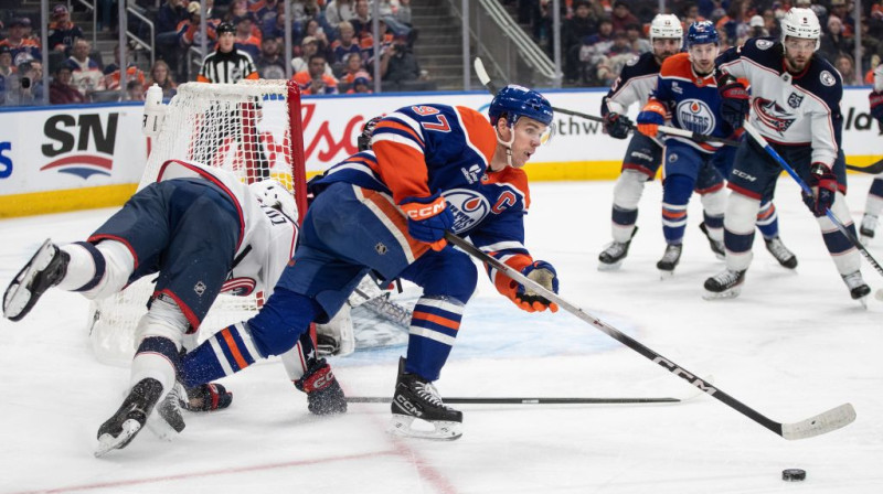 Konors Makdeivids ar ripu. Foto. AP. Scanpix