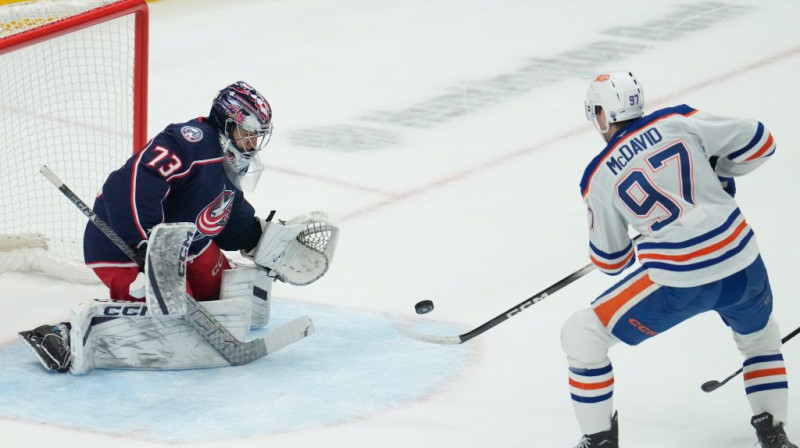 Džets Grīvss un Konors Makdeivids. Foto. AP. Scanpix
