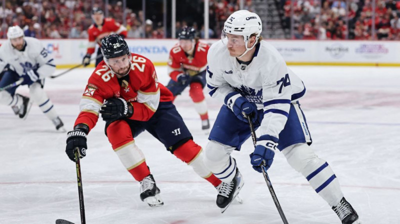 Jānis Uvis Balinskis un Bobijs Makmens. Foto. AFP/Scanpix