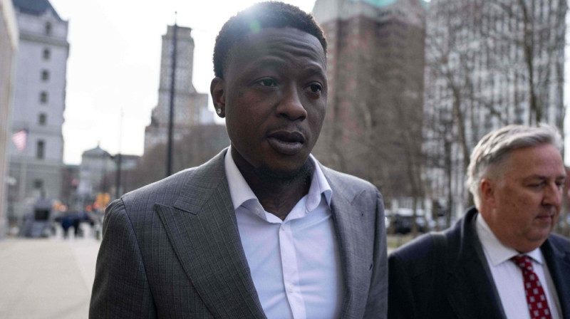 Terijs Rozjērs ceļā uz tiesas zāli. Foto: AP/Scanpix