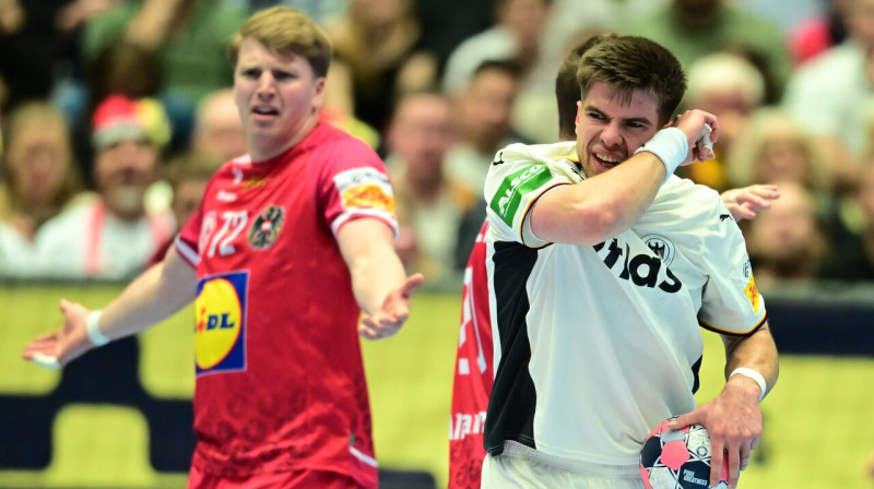 Renārs Uščins Vācijas valstsvienības cīņā pret austriešiem. Foto: Sina Schuldt/DPA/Picture-Alliance/Scanpix