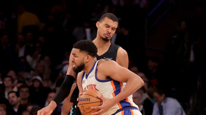 Kārls Entonijs Taunss pret Viktoru Vembanjamā. Foto: Imagn Images/Scanpix