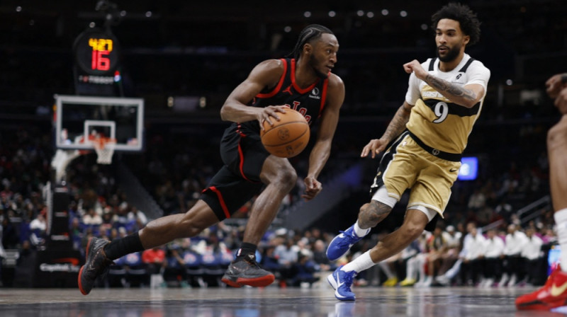 Imanuels Kviklijs pret Džastinu Šampenī. Foto: Reuters/Scanpix