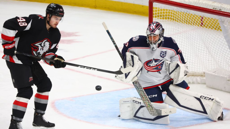 Taisons Kozaks un Džets Grīvss. Foto. AP. Scanpix