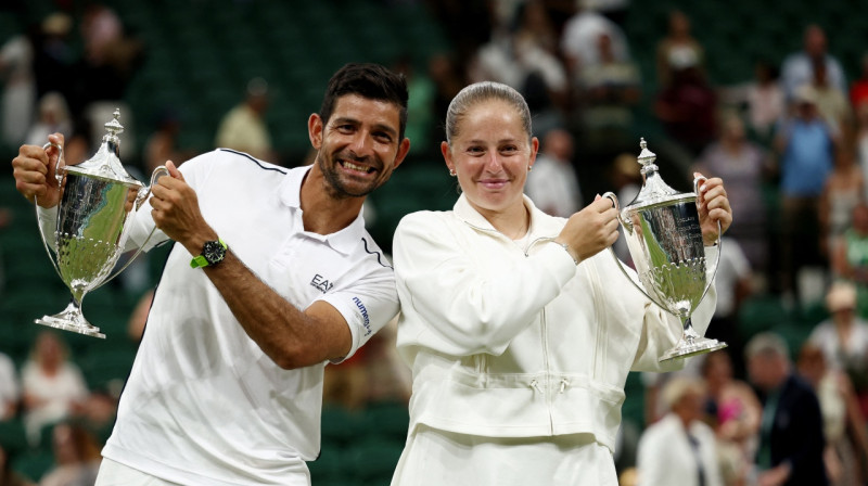 Marselo Arevalo un Aļona Ostapenko. Foto: Reuters/Scanpix