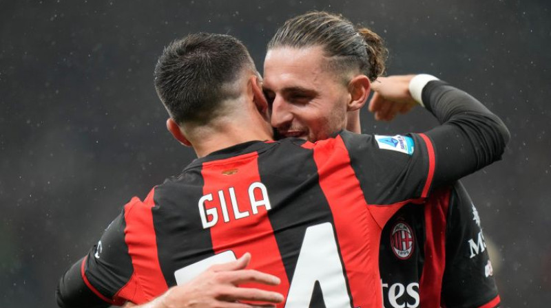 Mario Žila un Adrjēns Rabio. Foto: AP/Scanpix